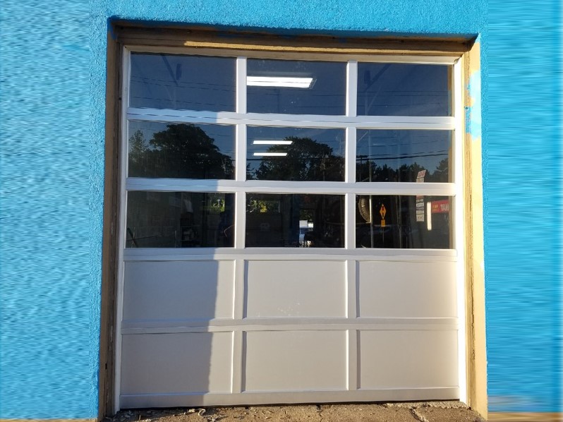 Aluminum sectional door with windows - Bartco