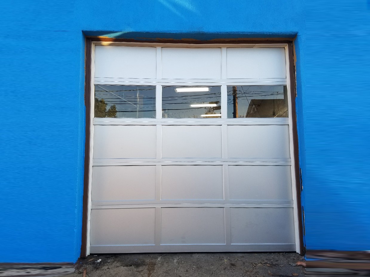 Aluminum sectional door half view - Bartco