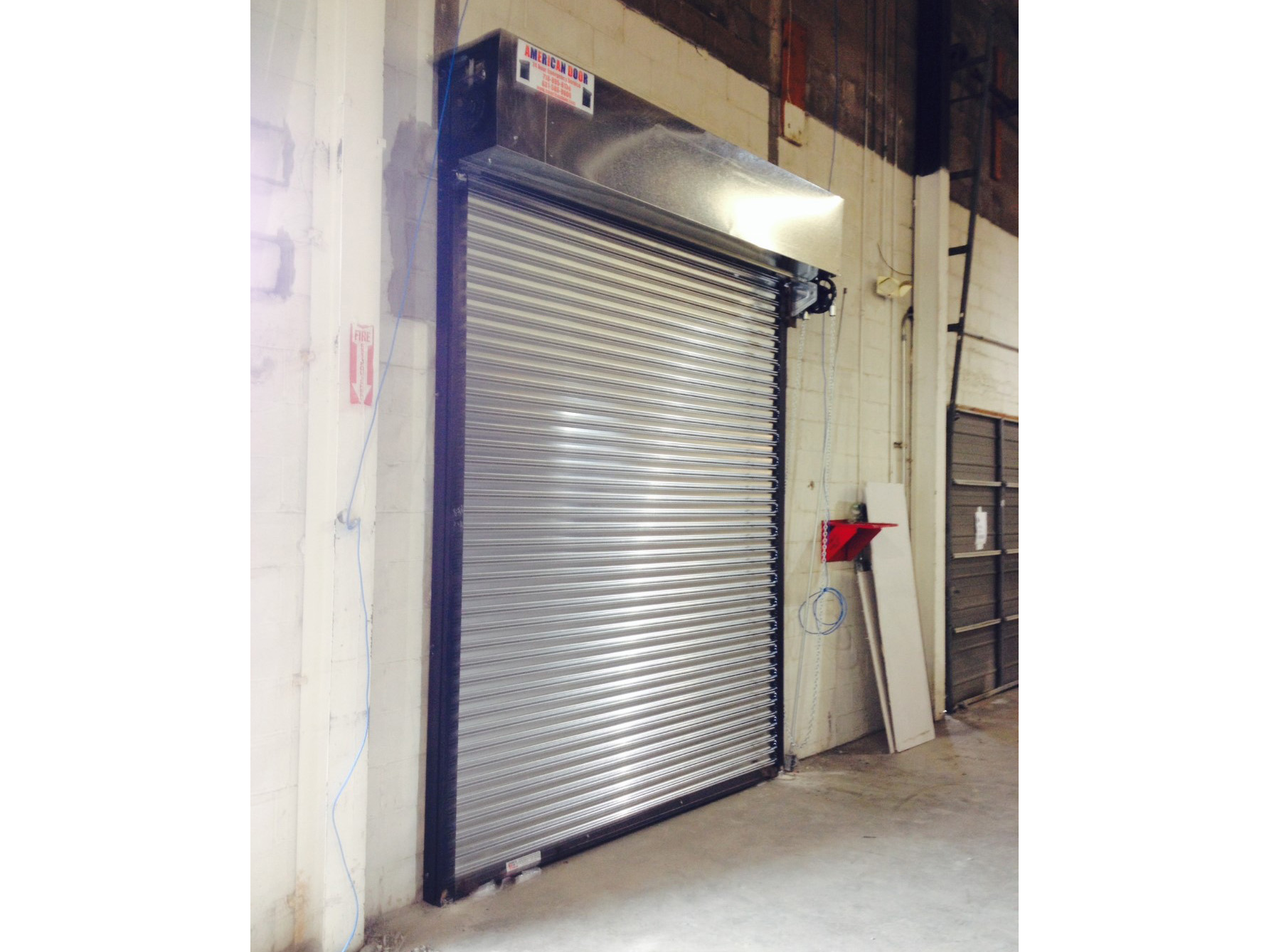 Secured rolling garage door - rech_melville